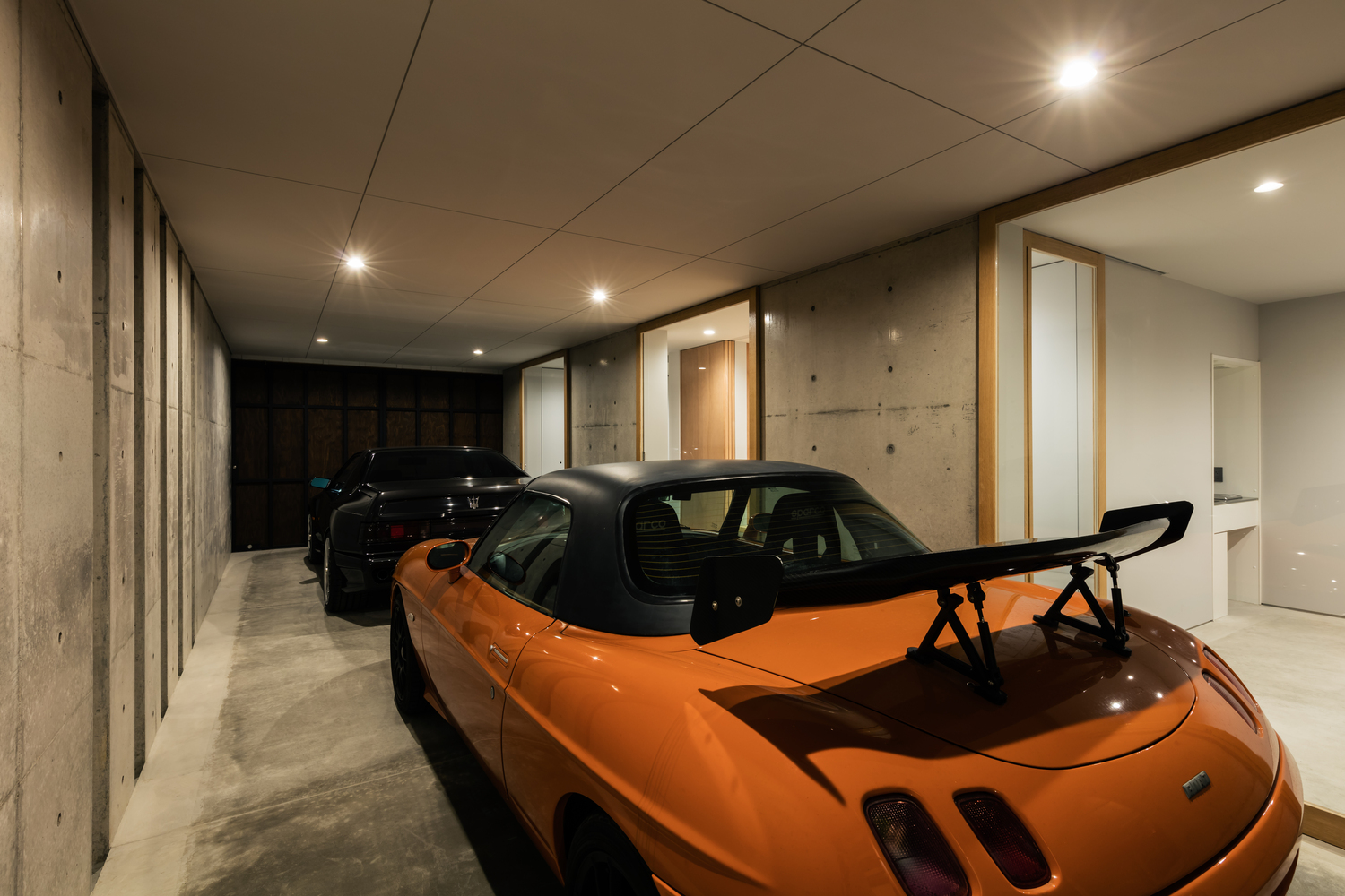 A Warm and Cozy Concrete Home for a Car and Bike Enthusiast in Kawagoe by Horibe Associates (16)