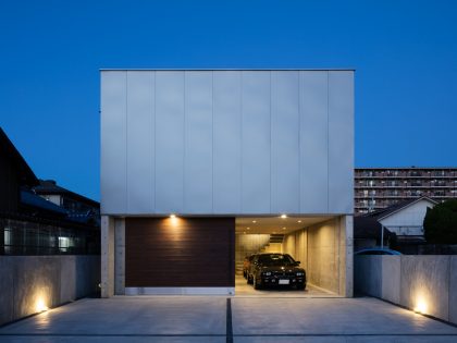 A Warm and Cozy Concrete Home for a Car and Bike Enthusiast in Kawagoe by Horibe Associates (17)