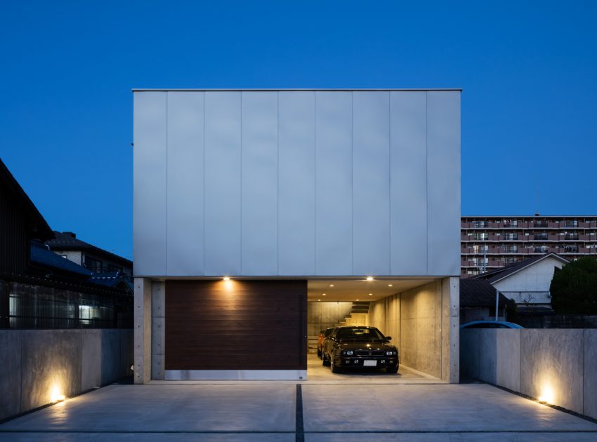 A Warm and Cozy Concrete Home for a Car and Bike Enthusiast in Kawagoe by Horibe Associates (17)