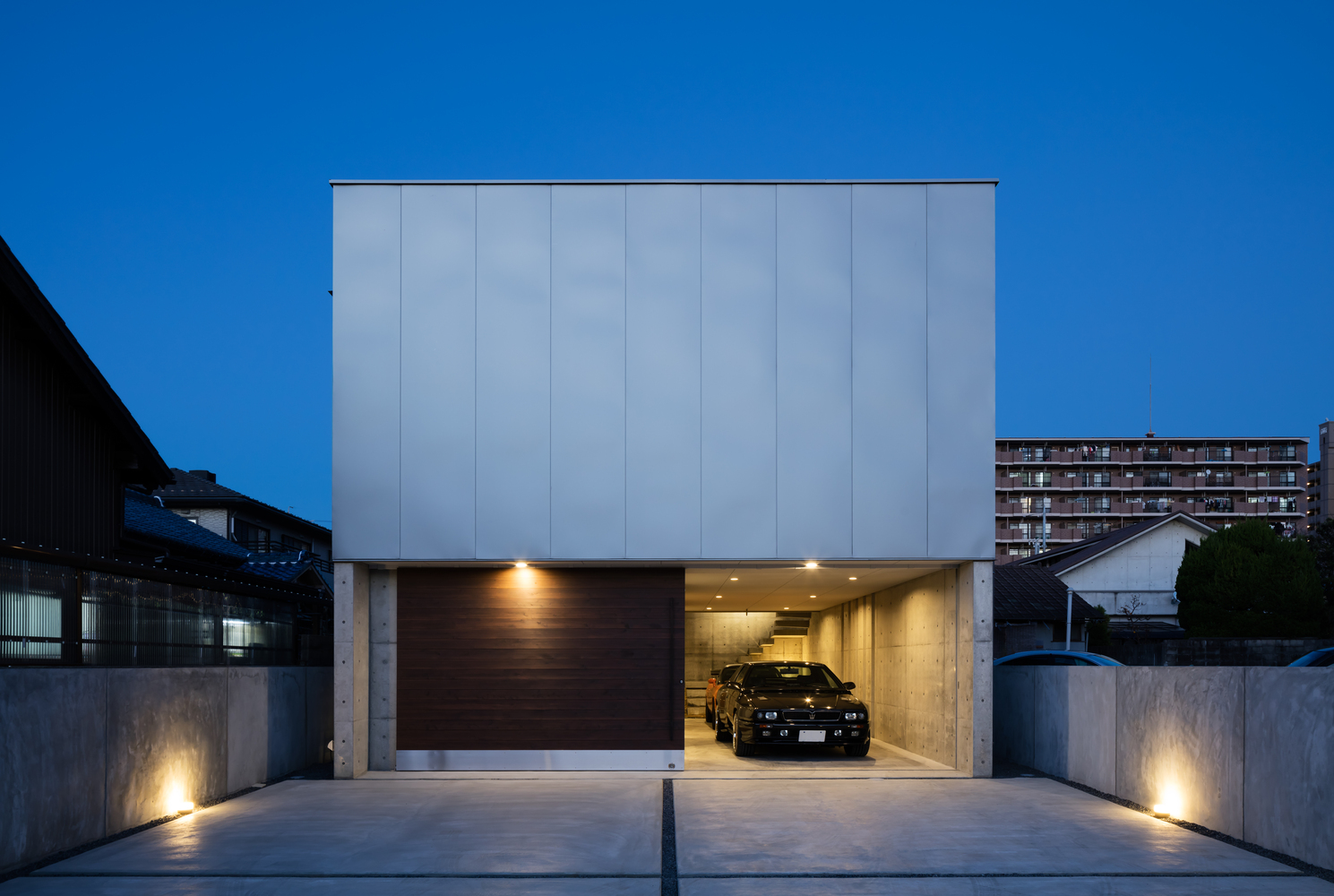 A Warm and Cozy Concrete Home for a Car and Bike Enthusiast in Kawagoe by Horibe Associates (17)