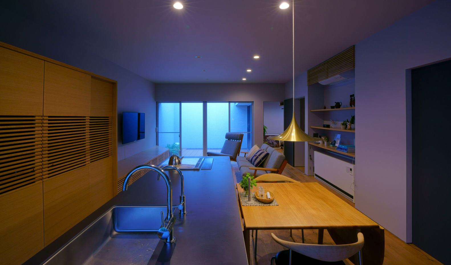 A Warm and Cozy Concrete Home for a Car and Bike Enthusiast in Kawagoe by Horibe Associates (20)