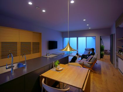 A Warm and Cozy Concrete Home for a Car and Bike Enthusiast in Kawagoe by Horibe Associates (21)