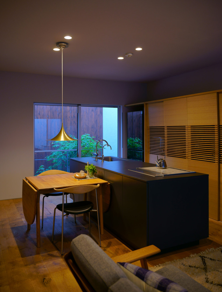 A Warm and Cozy Concrete Home for a Car and Bike Enthusiast in Kawagoe by Horibe Associates (22)