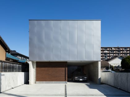 A Warm and Cozy Concrete Home for a Car and Bike Enthusiast in Kawagoe by Horibe Associates (3)