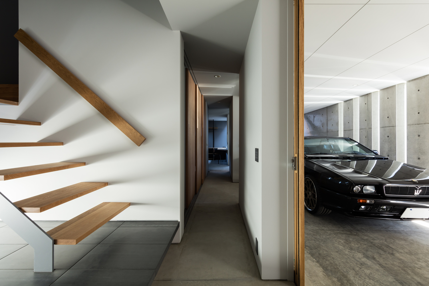 A Warm and Cozy Concrete Home for a Car and Bike Enthusiast in Kawagoe by Horibe Associates (5)