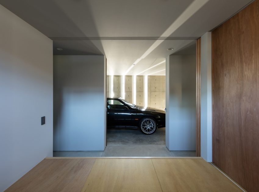 A Warm and Cozy Concrete Home for a Car and Bike Enthusiast in Kawagoe by Horibe Associates (6)