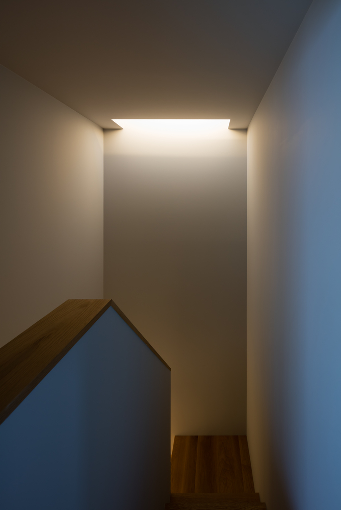 A Warm and Cozy Concrete Home for a Car and Bike Enthusiast in Kawagoe by Horibe Associates (9)