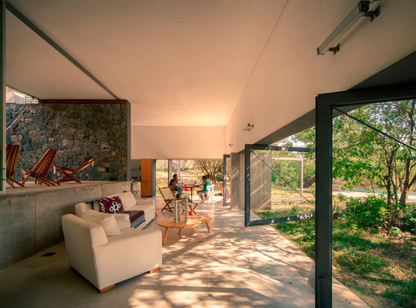 An Elegant Contemporary Home with Pivoting Glass Walls in Tepoztlán, Mexico by EDAA – Estrategias para el Desarrollo de Arquitectura (13)