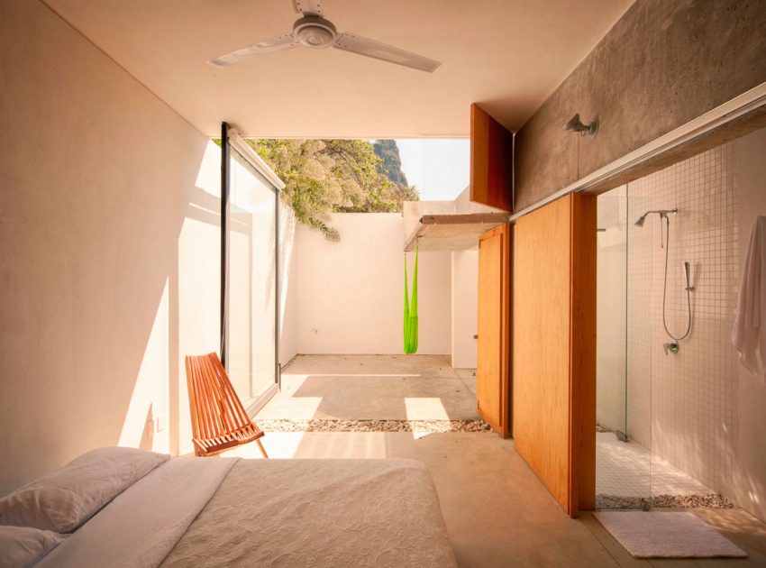 An Elegant Contemporary Home with Pivoting Glass Walls in Tepoztlán, Mexico by EDAA – Estrategias para el Desarrollo de Arquitectura (15)