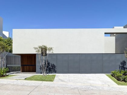 An Elegant Home with Design Focused on Concrete, Wood and Stone Elements in Zapopan, Mexico by Elías Rizo Arquitectos (1)