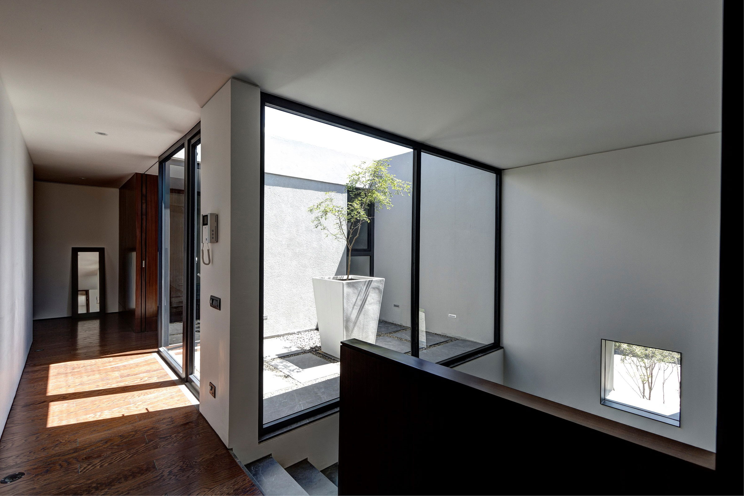 An Elegant Home with Design Focused on Concrete, Wood and Stone Elements in Zapopan, Mexico by Elías Rizo Arquitectos (13)