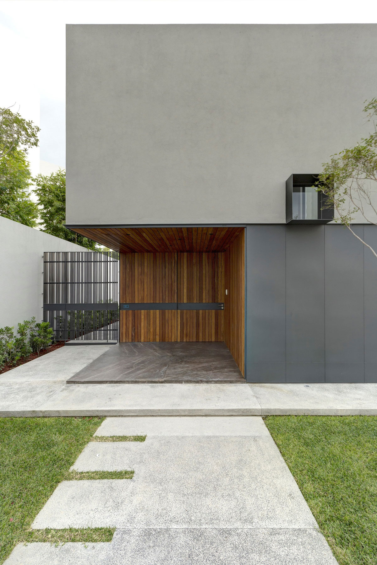 An Elegant Home with Design Focused on Concrete, Wood and Stone Elements in Zapopan, Mexico by Elías Rizo Arquitectos (3)