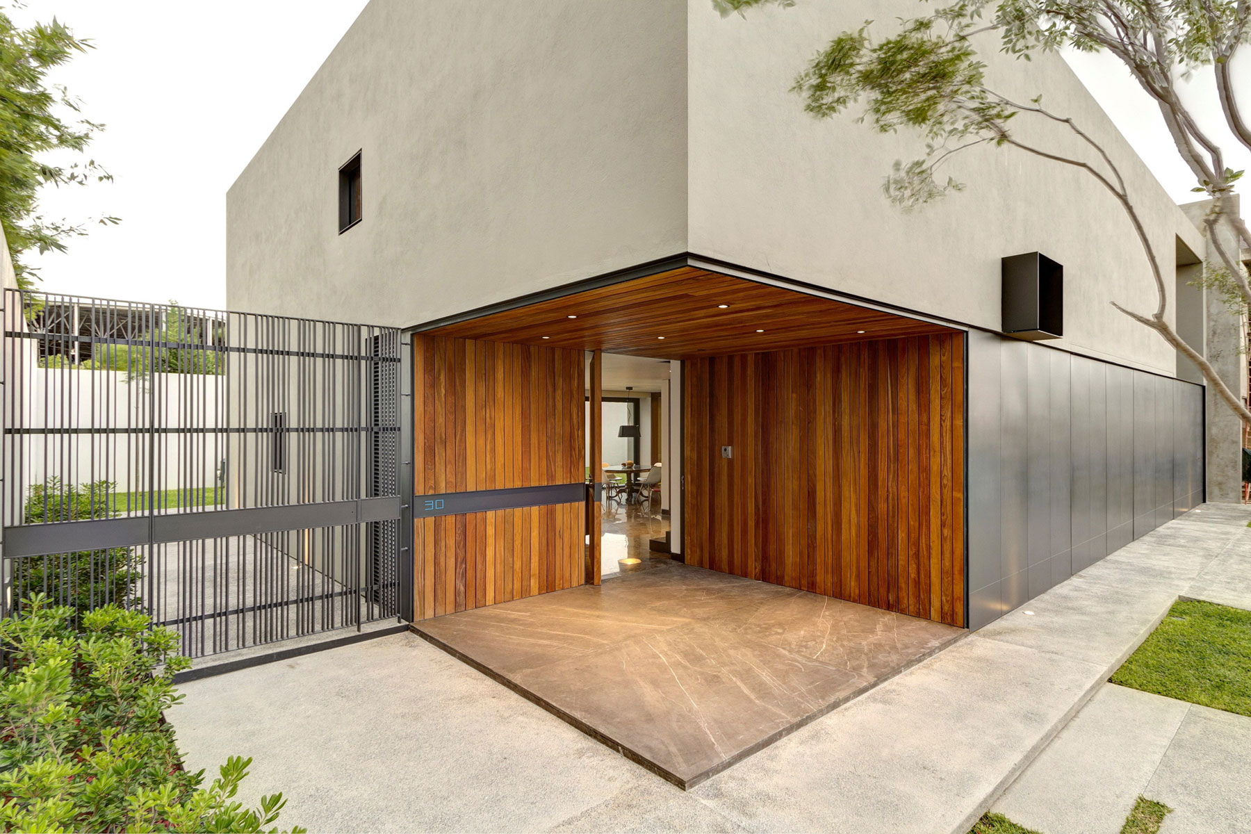 An Elegant Home with Design Focused on Concrete, Wood and Stone Elements in Zapopan, Mexico by Elías Rizo Arquitectos (5)