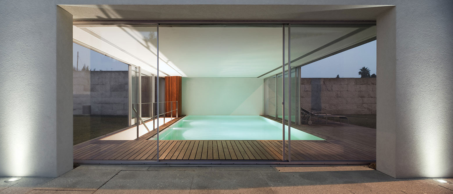 An Elegant Modern House with Courtyards and Pool Flanked by Stone Walls in Porto, Portugal by Sérgio Koch (6)
