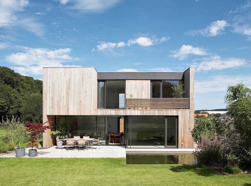 An Elegant Modern House with Open Spaces and Wall Openings in Hagen, Germany by Zamel Krug Architekten (3)