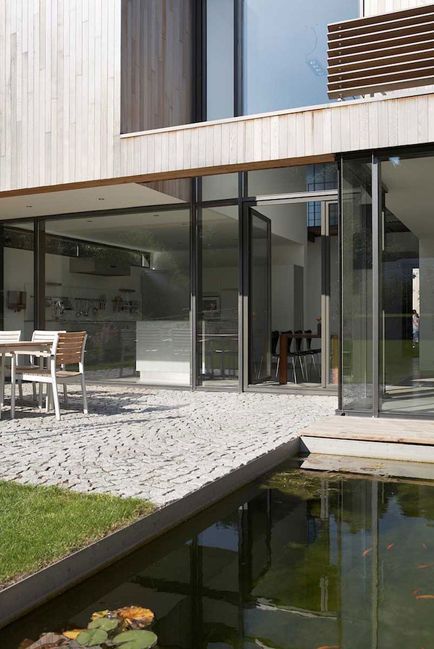 An Elegant Modern House with Open Spaces and Wall Openings in Hagen, Germany by Zamel Krug Architekten (4)