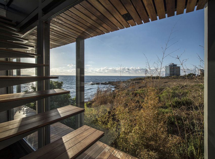 An Elegant Modern Seaside Home Perched on the Edge of a Cliff with Rooftop Deck in Amchit, Lebanon by BLANKPAGE Architects (11)