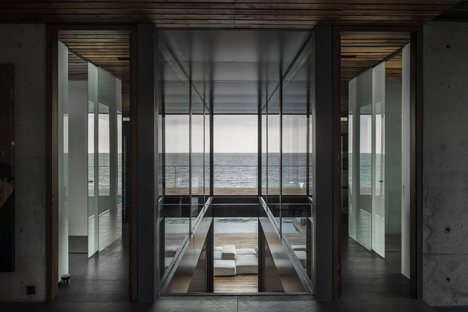 An Elegant Modern Seaside Home Perched on the Edge of a Cliff with Rooftop Deck in Amchit, Lebanon by BLANKPAGE Architects (12)