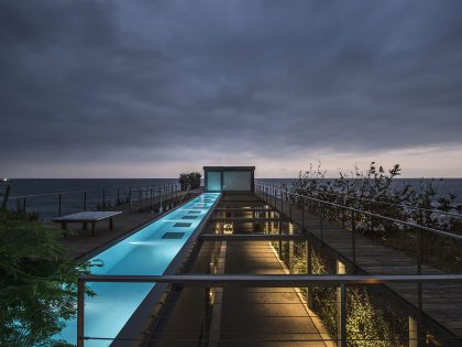 An Elegant Modern Seaside Home Perched on the Edge of a Cliff with Rooftop Deck in Amchit, Lebanon by BLANKPAGE Architects (16)