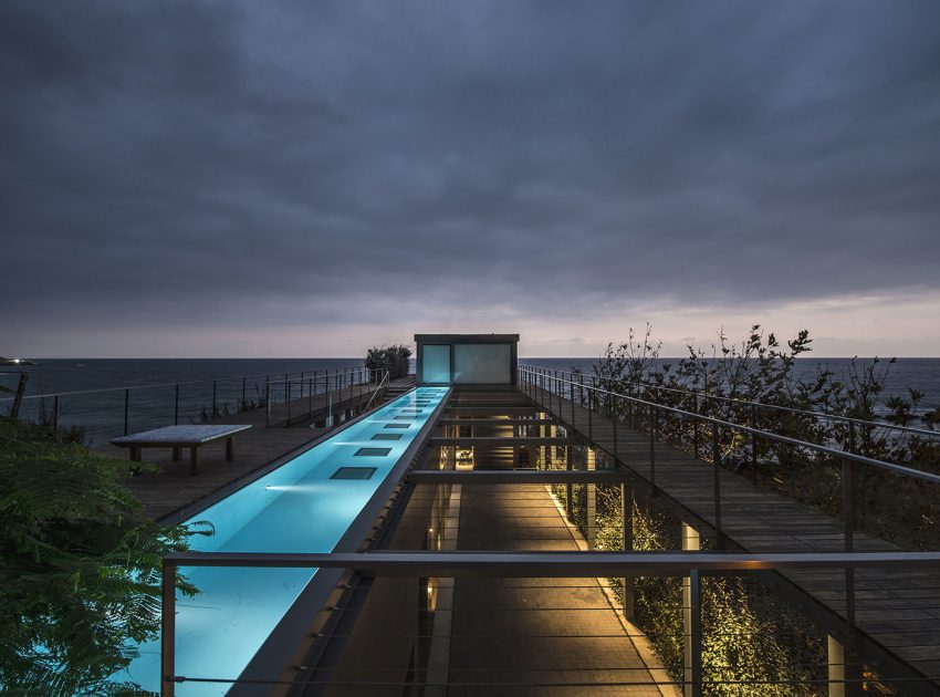 An Elegant Modern Seaside Home Perched on the Edge of a Cliff with Rooftop Deck in Amchit, Lebanon by BLANKPAGE Architects (16)