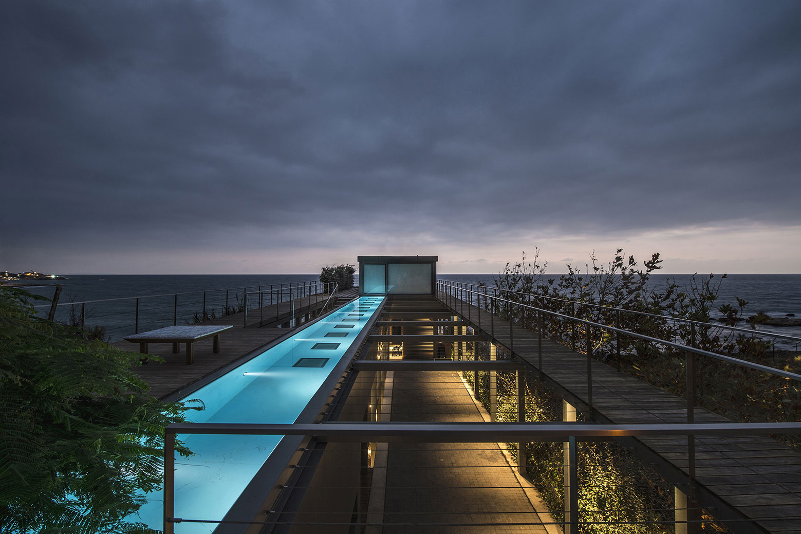 An Elegant Modern Seaside Home Perched on the Edge of a Cliff with Rooftop Deck in Amchit, Lebanon by BLANKPAGE Architects (16)