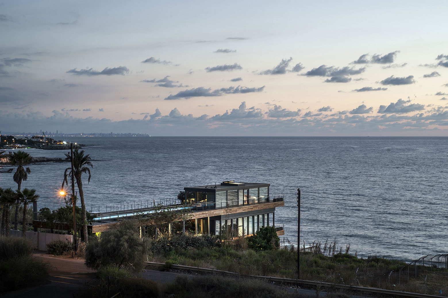An Elegant Modern Seaside Home Perched on the Edge of a Cliff with Rooftop Deck in Amchit, Lebanon by BLANKPAGE Architects (19)