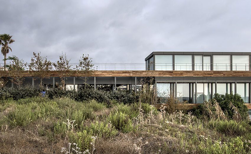 An Elegant Modern Seaside Home Perched on the Edge of a Cliff with Rooftop Deck in Amchit, Lebanon by BLANKPAGE Architects (3)