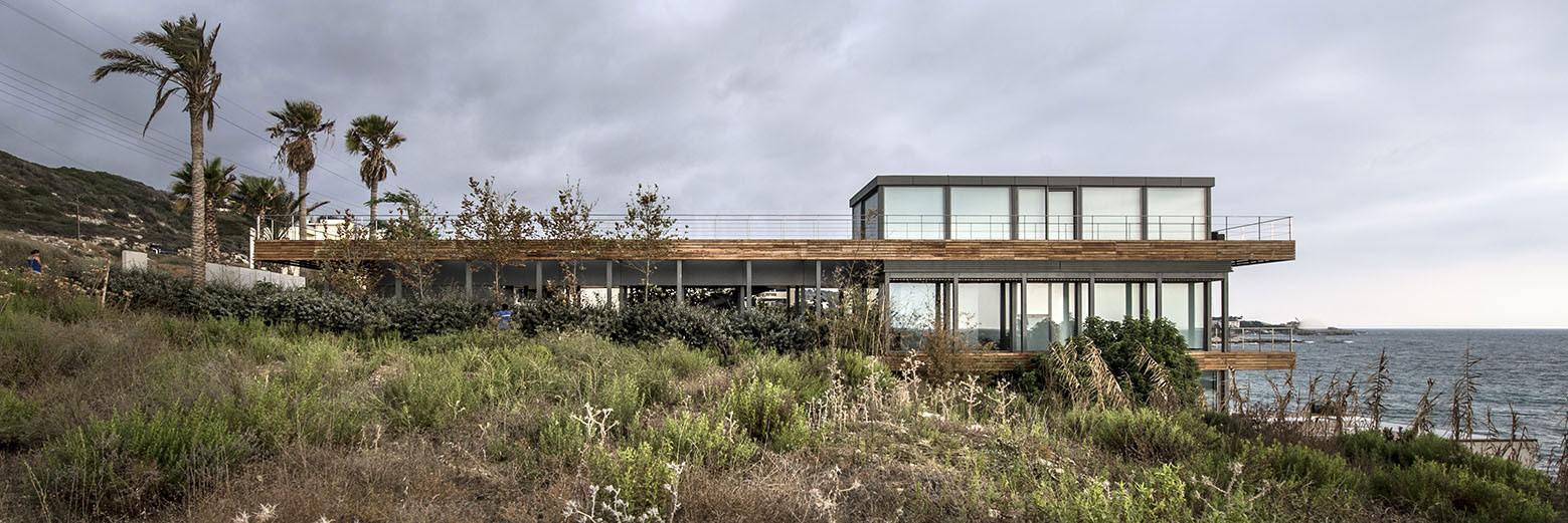 An Elegant Modern Seaside Home Perched on the Edge of a Cliff with Rooftop Deck in Amchit, Lebanon by BLANKPAGE Architects (3)