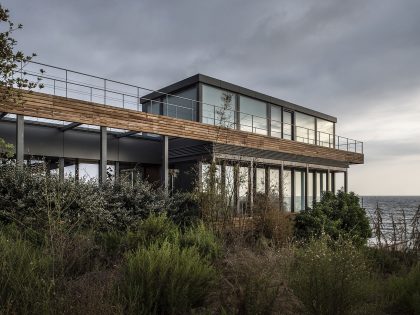 An Elegant Modern Seaside Home Perched on the Edge of a Cliff with Rooftop Deck in Amchit, Lebanon by BLANKPAGE Architects (5)