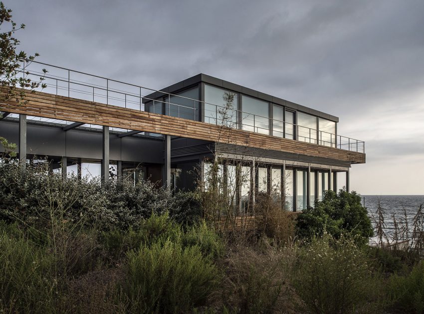 An Elegant Modern Seaside Home Perched on the Edge of a Cliff with Rooftop Deck in Amchit, Lebanon by BLANKPAGE Architects (5)