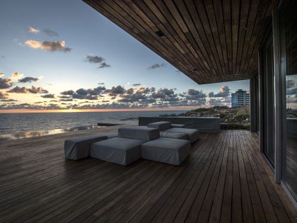 An Elegant Modern Seaside Home Perched on the Edge of a Cliff with Rooftop Deck in Amchit, Lebanon by BLANKPAGE Architects (6)