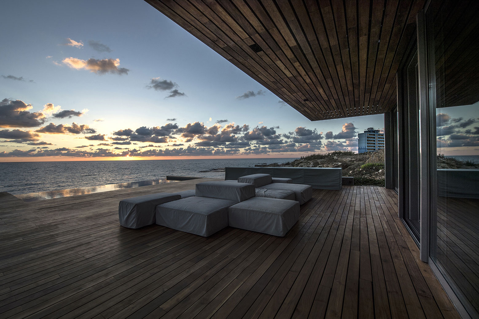 An Elegant Modern Seaside Home Perched on the Edge of a Cliff with Rooftop Deck in Amchit, Lebanon by BLANKPAGE Architects (6)