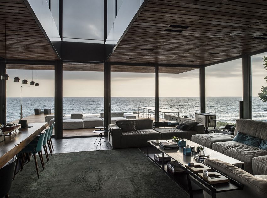 An Elegant Modern Seaside Home Perched on the Edge of a Cliff with Rooftop Deck in Amchit, Lebanon by BLANKPAGE Architects (8)