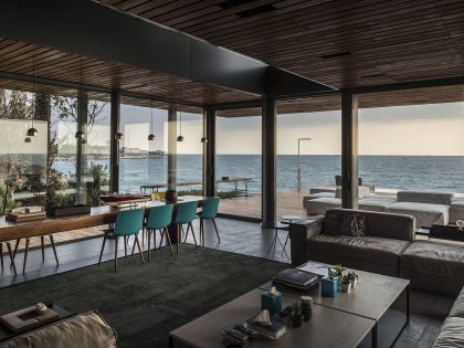 An Elegant Modern Seaside Home Perched on the Edge of a Cliff with Rooftop Deck in Amchit, Lebanon by BLANKPAGE Architects (9)
