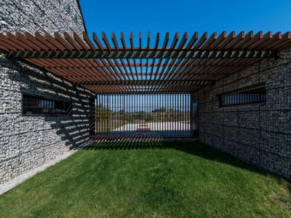 An Elegant and Airy Contemporary Home with Gabion Walls in Zawiercie, Poland by Kropka Studio (11)