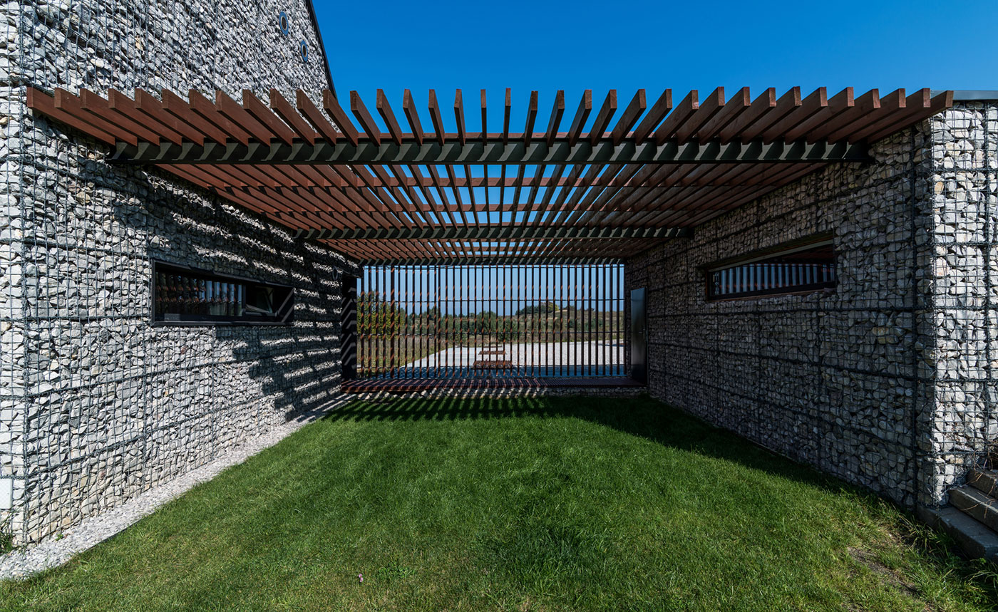 An Elegant and Airy Contemporary Home with Gabion Walls in Zawiercie, Poland by Kropka Studio (11)