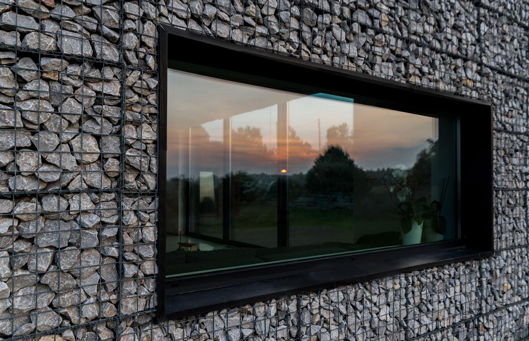 An Elegant and Airy Contemporary Home with Gabion Walls in Zawiercie, Poland by Kropka Studio (13)