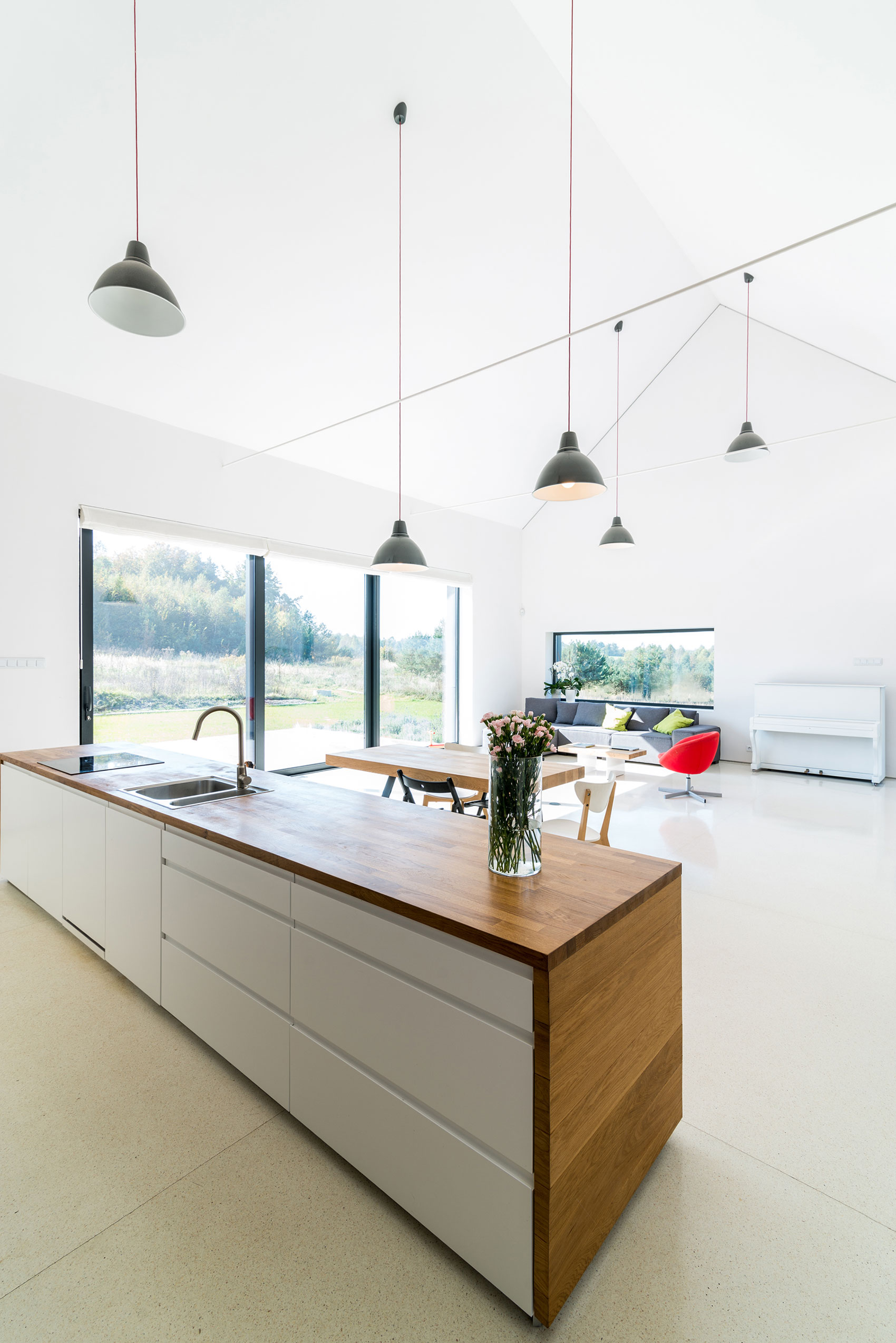 An Elegant and Airy Contemporary Home with Gabion Walls in Zawiercie, Poland by Kropka Studio (15)