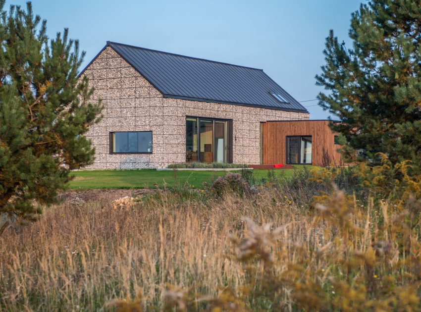 An Elegant and Airy Contemporary Home with Gabion Walls in Zawiercie, Poland by Kropka Studio (2)