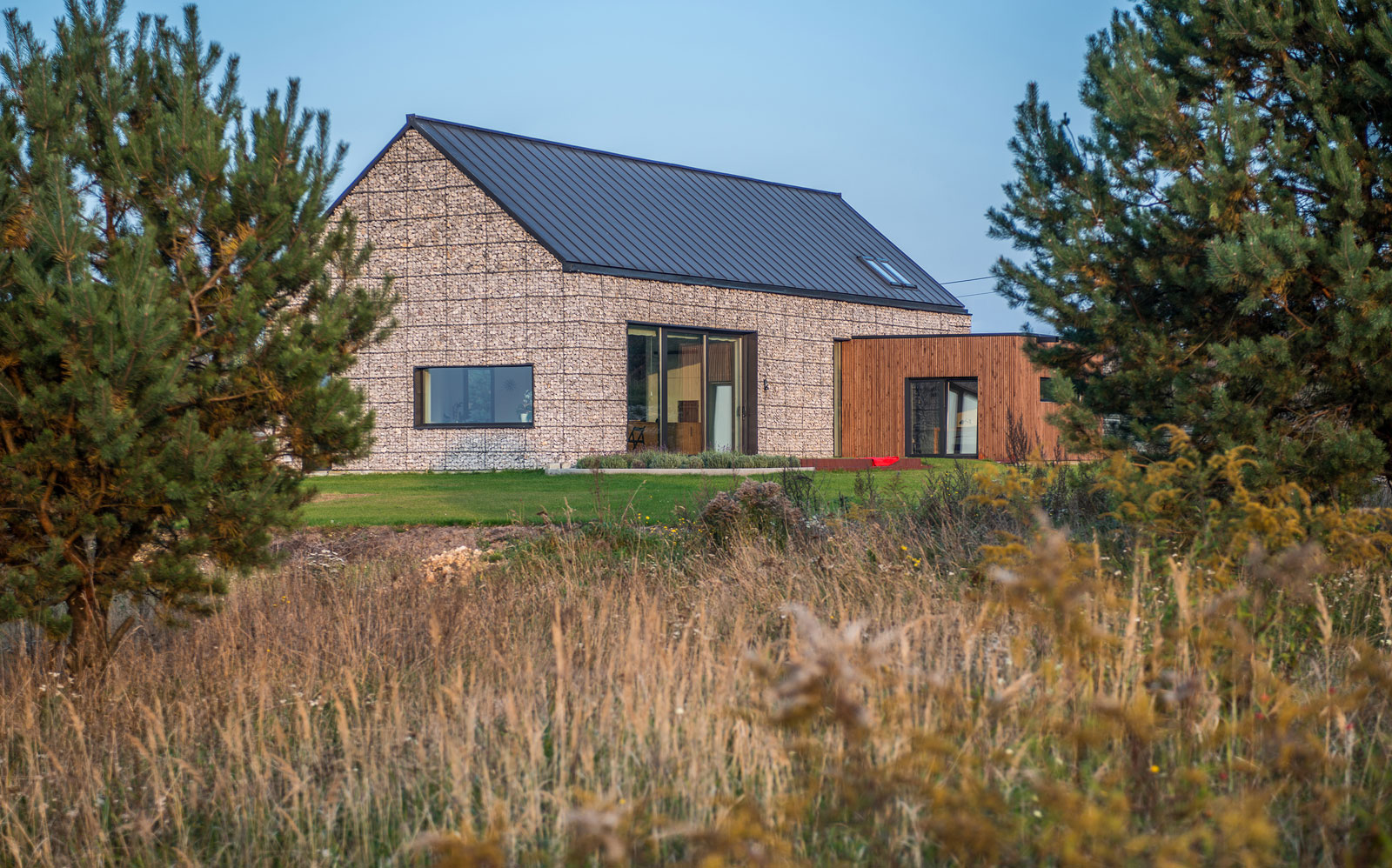 An Elegant and Airy Contemporary Home with Gabion Walls in Zawiercie, Poland by Kropka Studio (2)