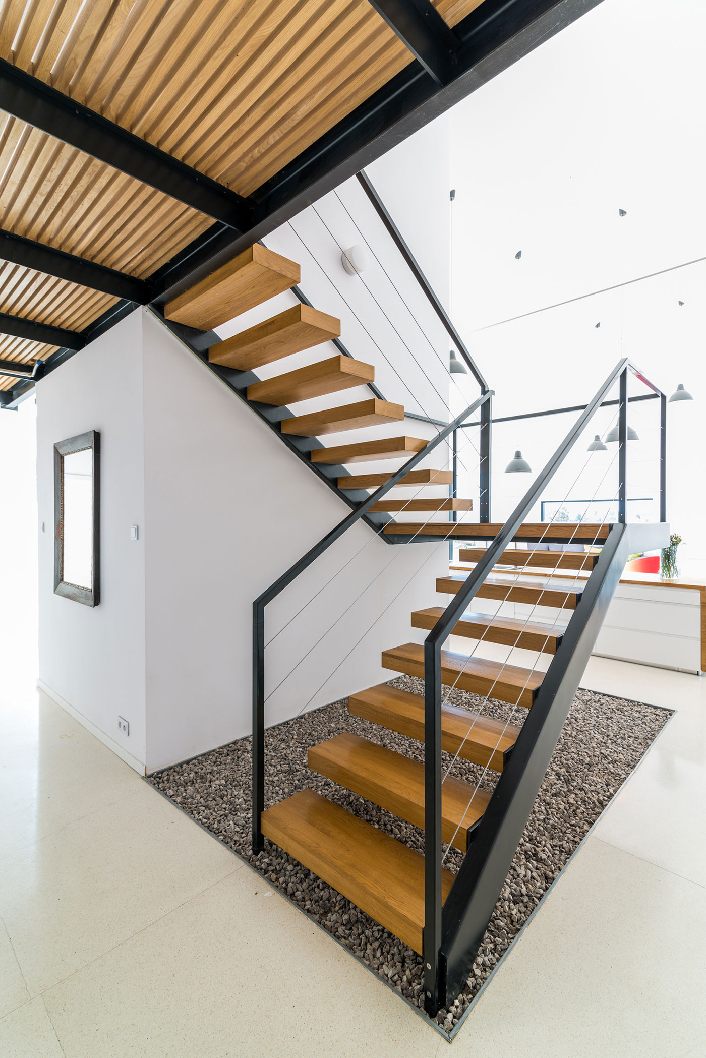 An Elegant and Airy Contemporary Home with Gabion Walls in Zawiercie, Poland by Kropka Studio (20)