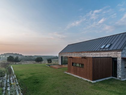 An Elegant and Airy Contemporary Home with Gabion Walls in Zawiercie, Poland by Kropka Studio (4)