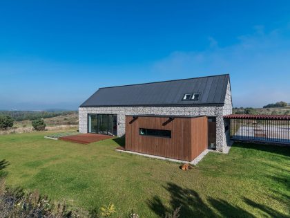 An Elegant and Airy Contemporary Home with Gabion Walls in Zawiercie, Poland by Kropka Studio (5)