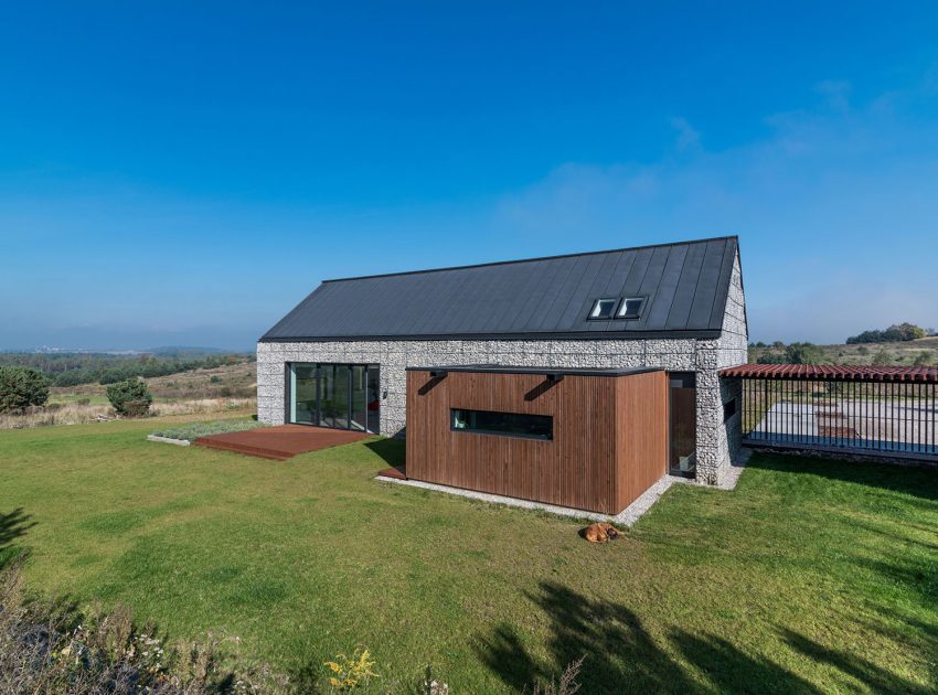 An Elegant and Airy Contemporary Home with Gabion Walls in Zawiercie, Poland by Kropka Studio (5)