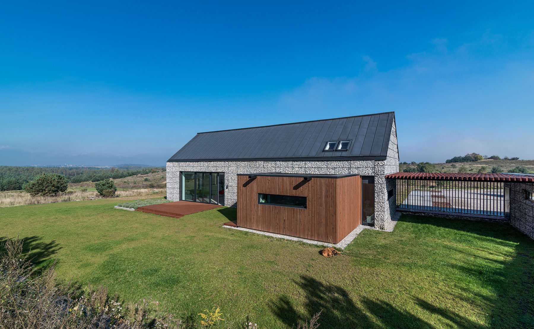 An Elegant and Airy Contemporary Home with Gabion Walls in Zawiercie, Poland by Kropka Studio (5)