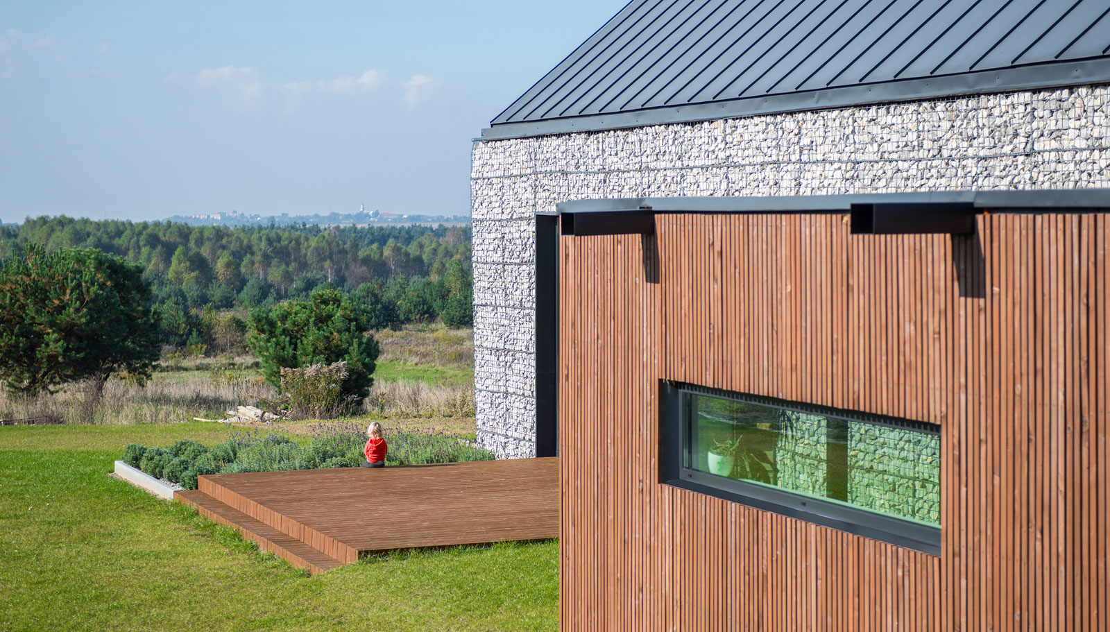 An Elegant and Airy Contemporary Home with Gabion Walls in Zawiercie, Poland by Kropka Studio (6)