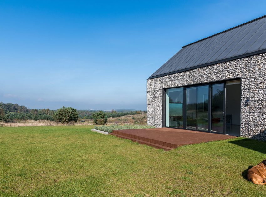 An Elegant and Airy Contemporary Home with Gabion Walls in Zawiercie, Poland by Kropka Studio (7)