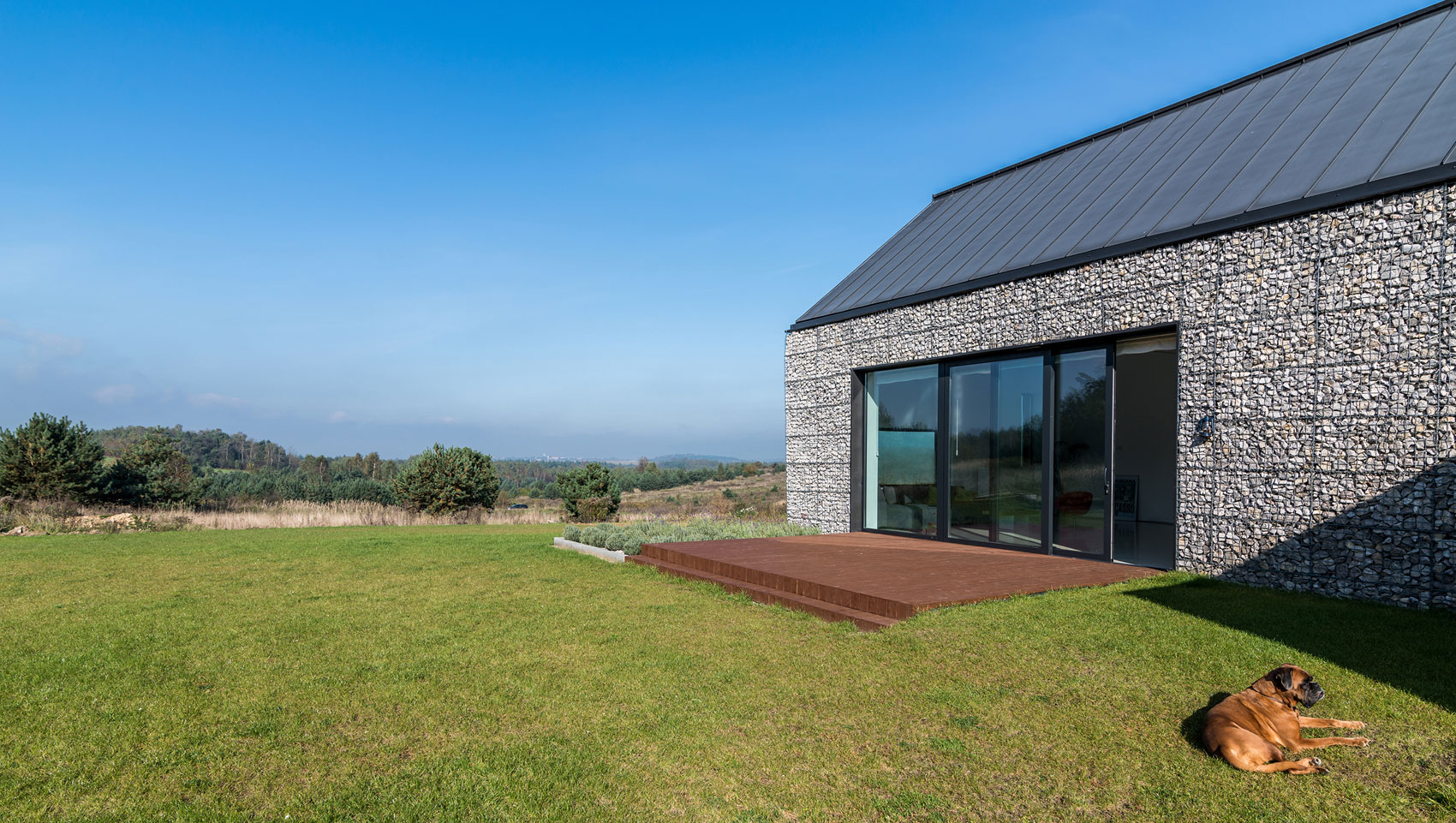 An Elegant and Airy Contemporary Home with Gabion Walls in Zawiercie, Poland by Kropka Studio (7)