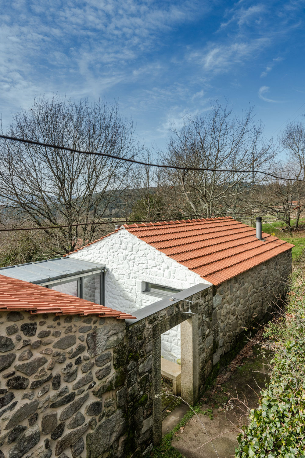 A 17th-Century Home Becomes a Surprising Contemporary House in Linhares, Portugal by Escritório de Arquitetos (5)