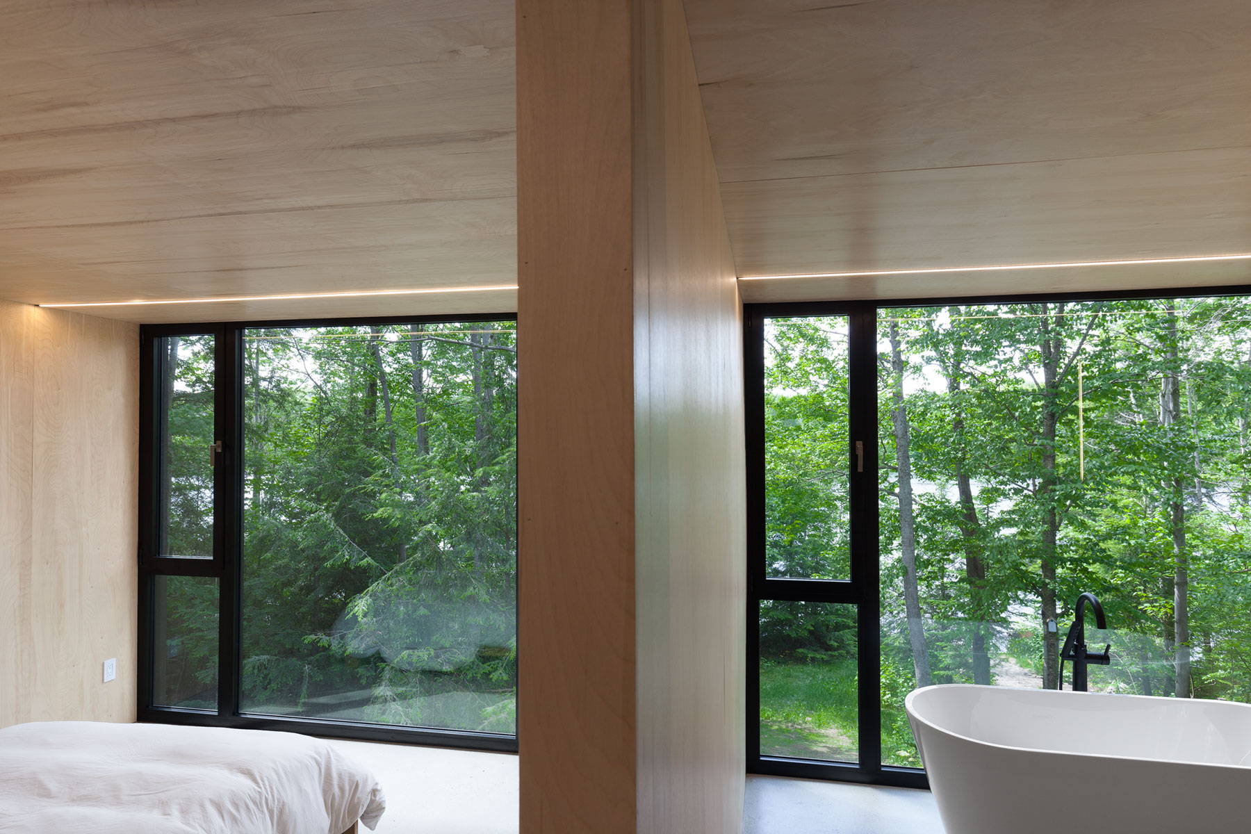 A Beautiful Family Home Nestled in the Woods of Quebec by Jean Verville architecte (18)